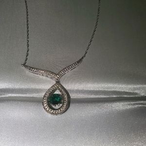 Emerald green white gold diamond necklace